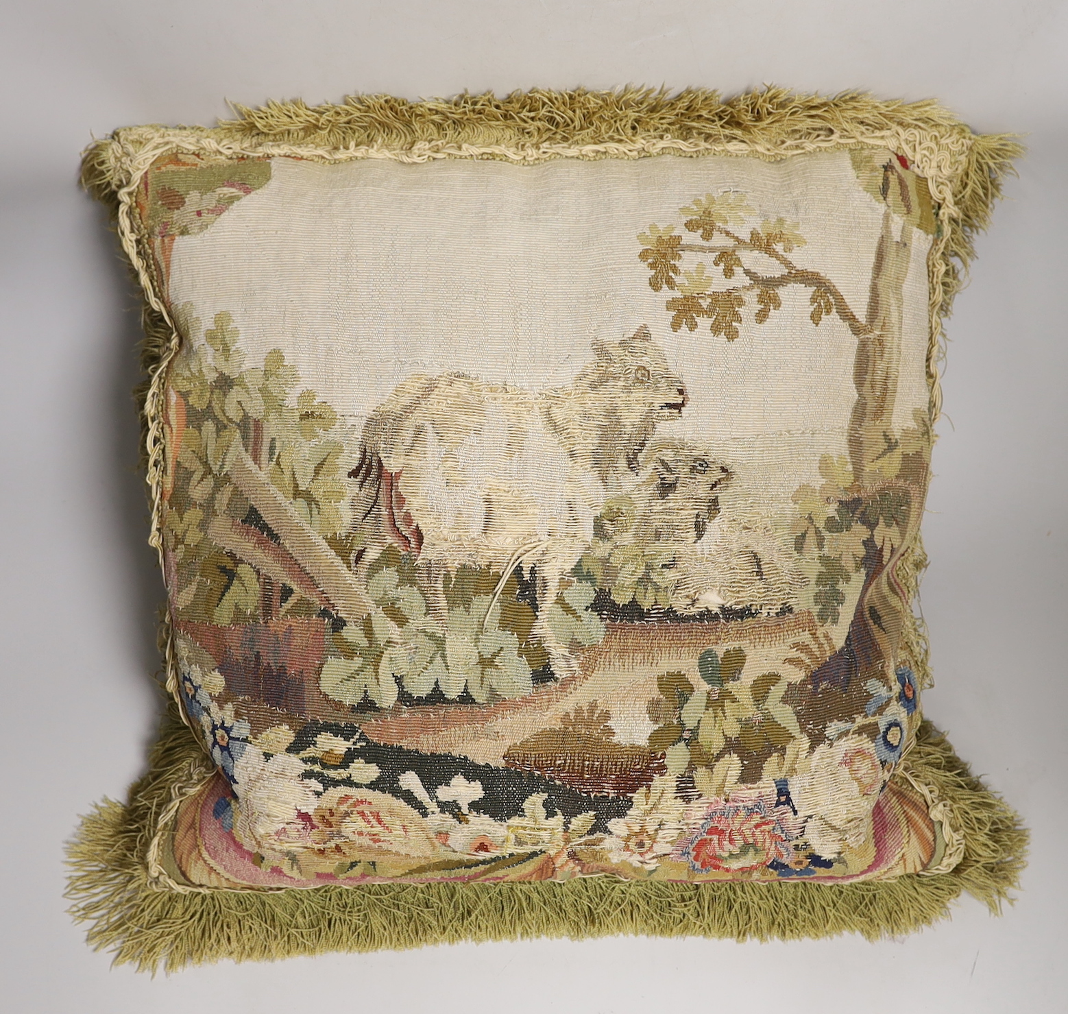 An 18th century tapestry cushion